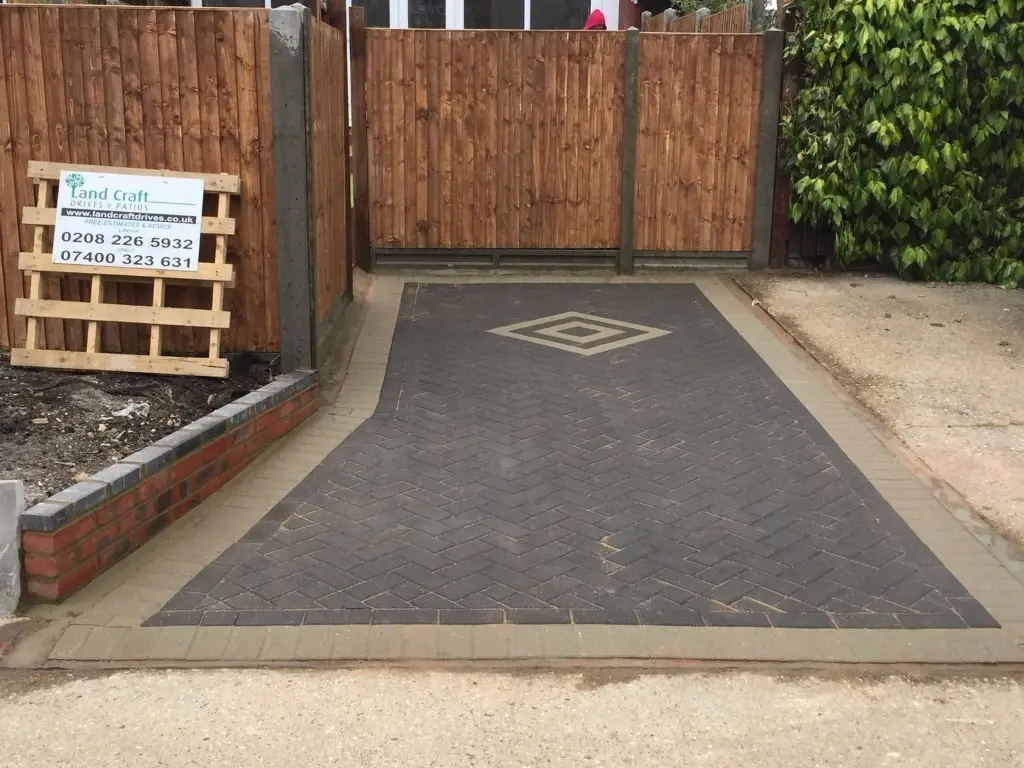 Charcoal block paved driveway with a diamond feature