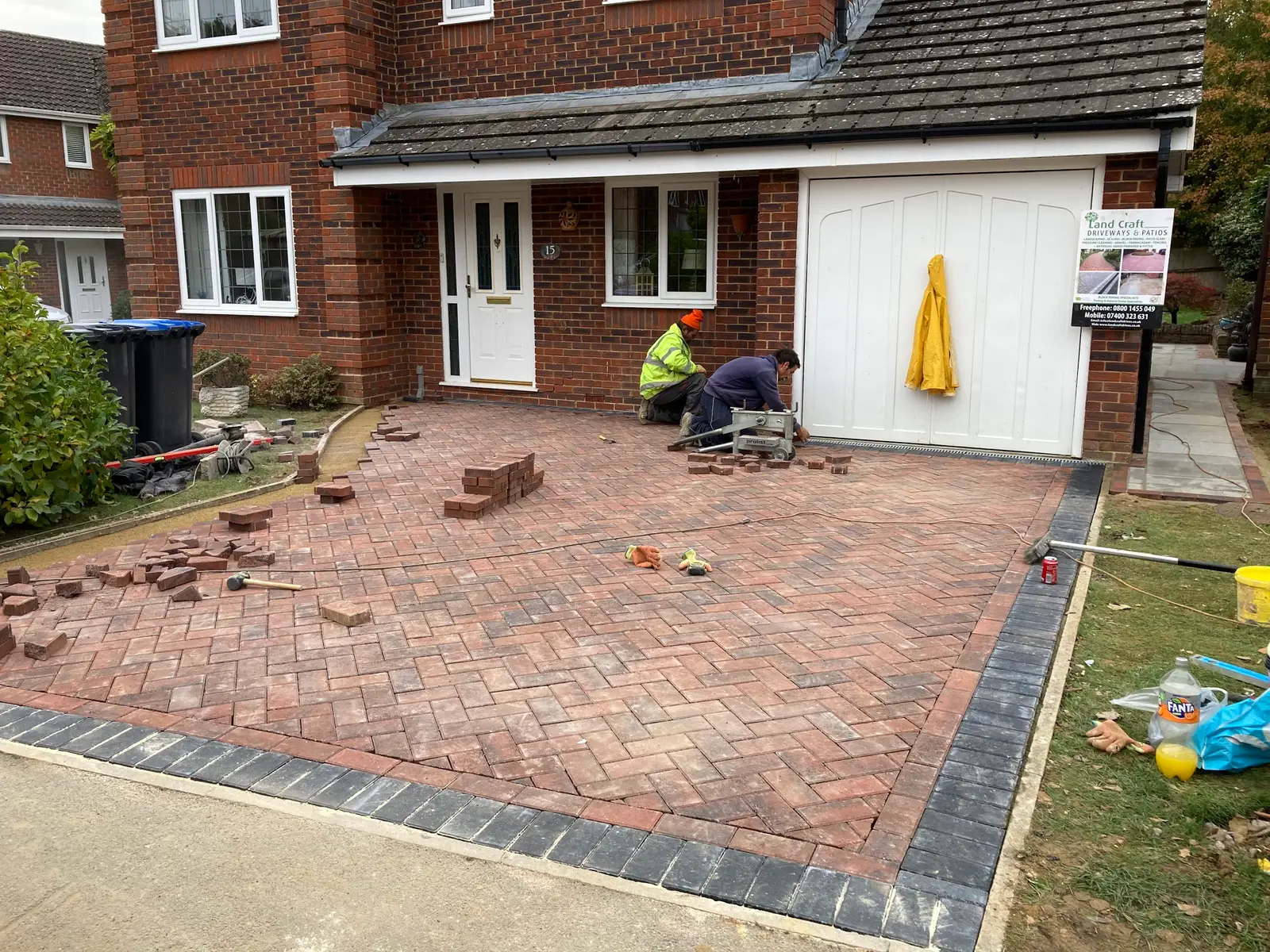 Herringbone block paving being laid