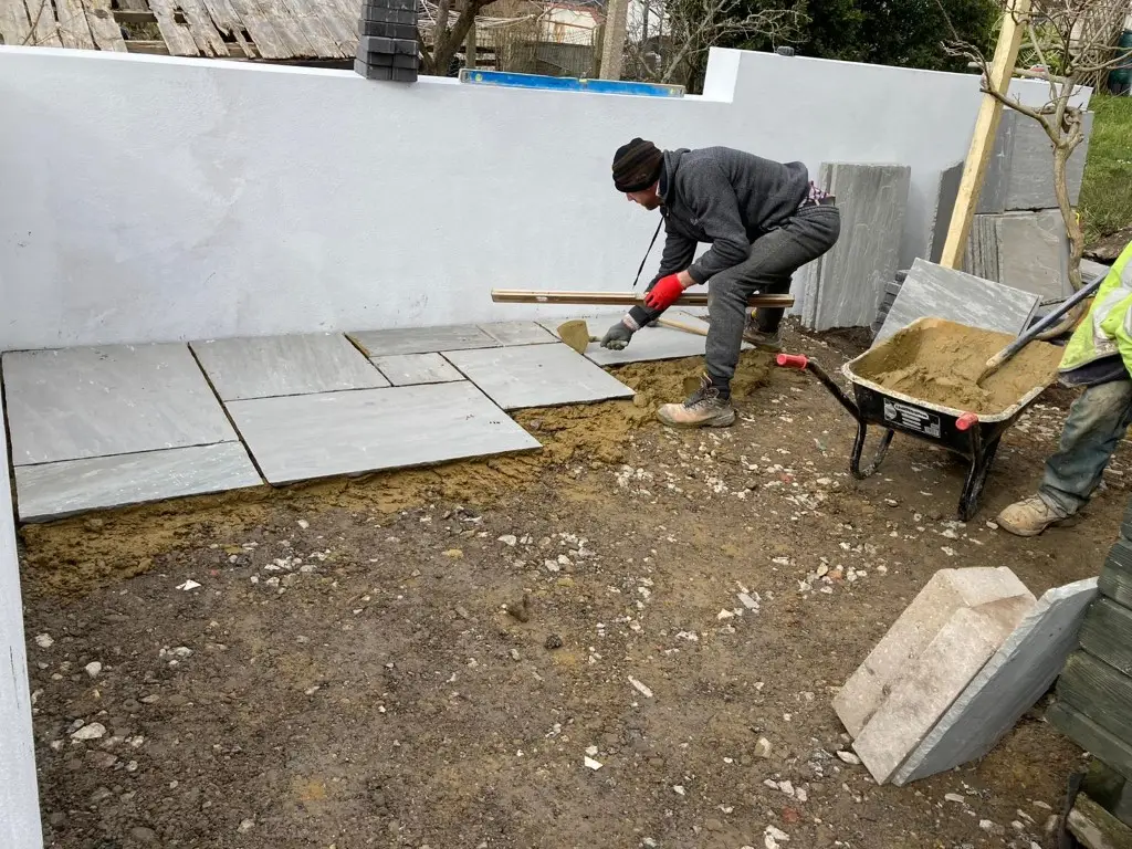 Slabs being bedded on mortar