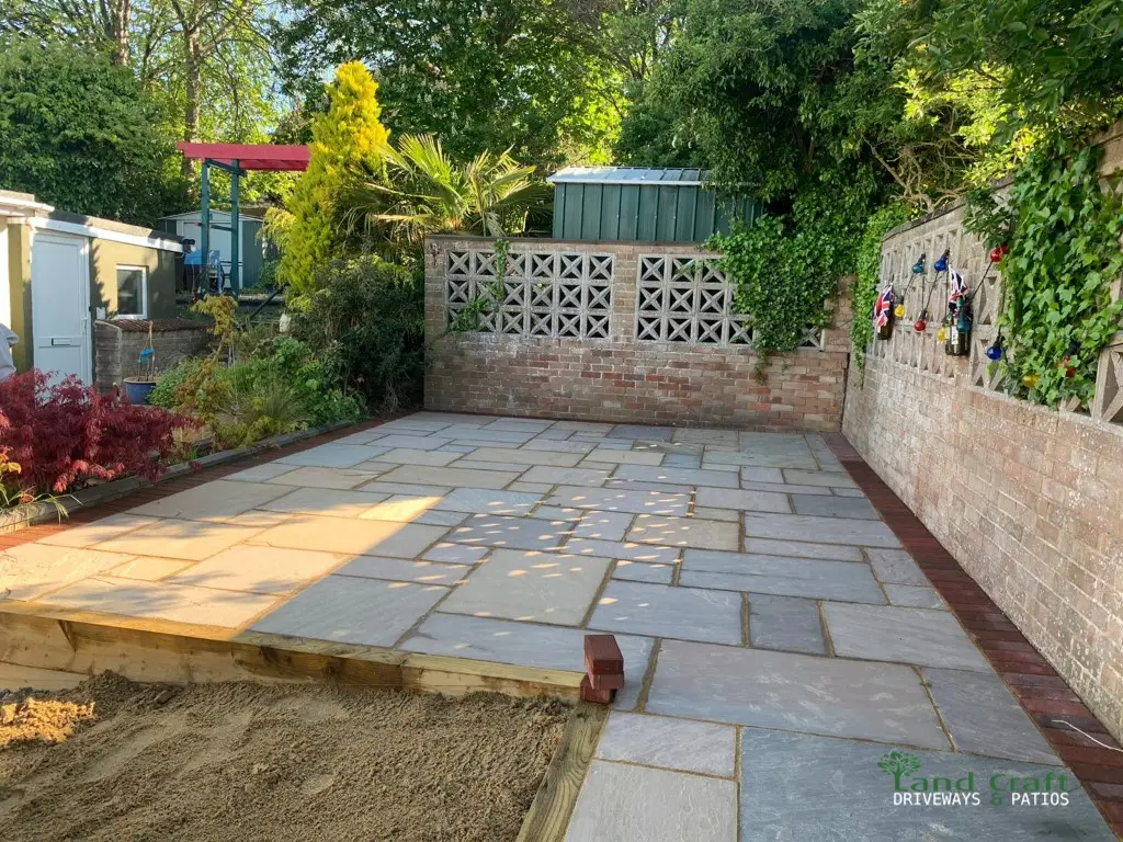 Grey slab patio in a courtyard garden