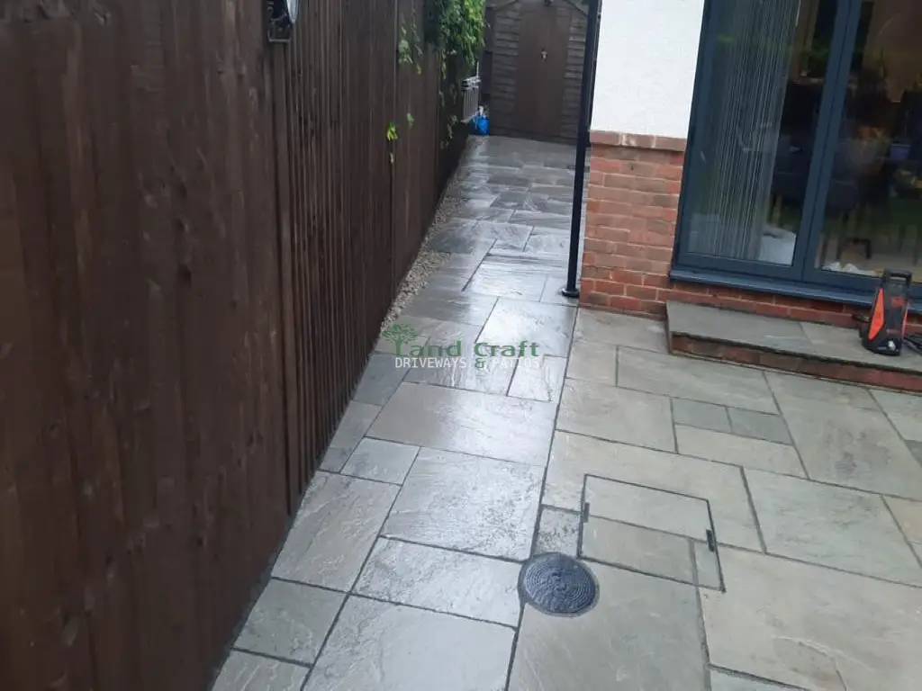 Grey porcelain paving along a side return