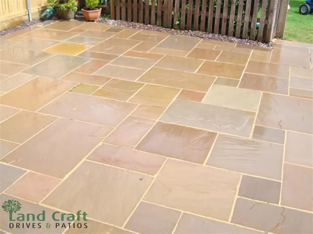 Indian sandstone patio laid in a random pattern